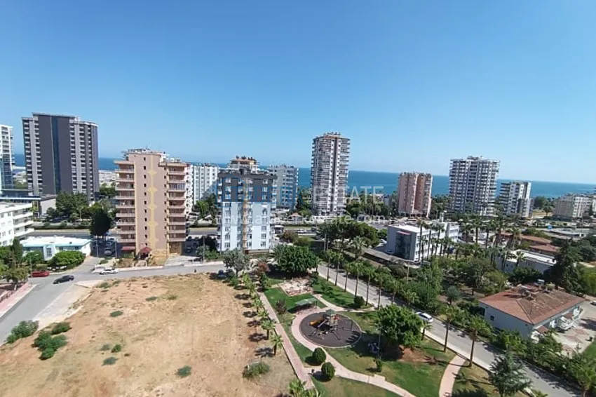 Квартира 4+1 с видом на море и горы в районе Енишехир-Мерсин 3 