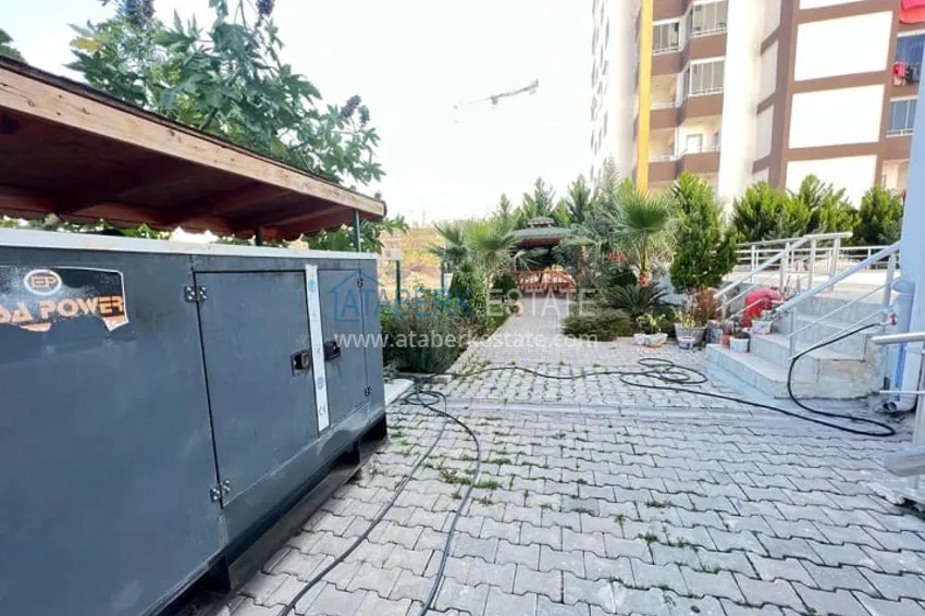 Квартира 1+1 в развивающемся районе Мерсина-Арпачбахшиш 2 