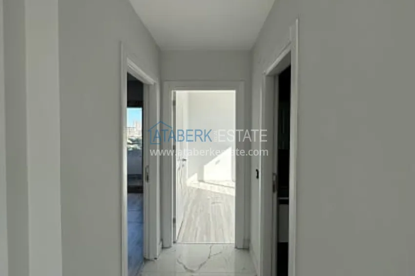 Приобрести Квартира 2+1 с чистовой отделкой, в новом ЖК с инфраструктурой, в районе Арпачбахшиш-Мерсин 13 