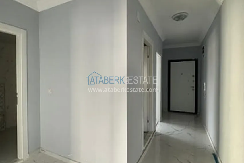 Приобрести Трехкомнатная квартира с застекленным балконом, в районе Эрдемли-Алата 13 