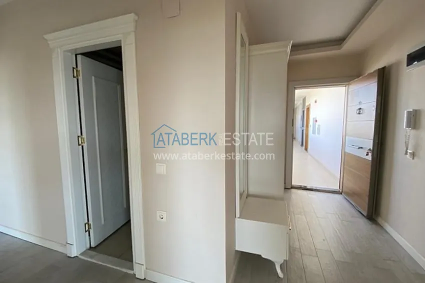 Приобрести Трехкомнатные апартаменты с видом на море и горе в уютном районе Томюк-Эрдемли 8 