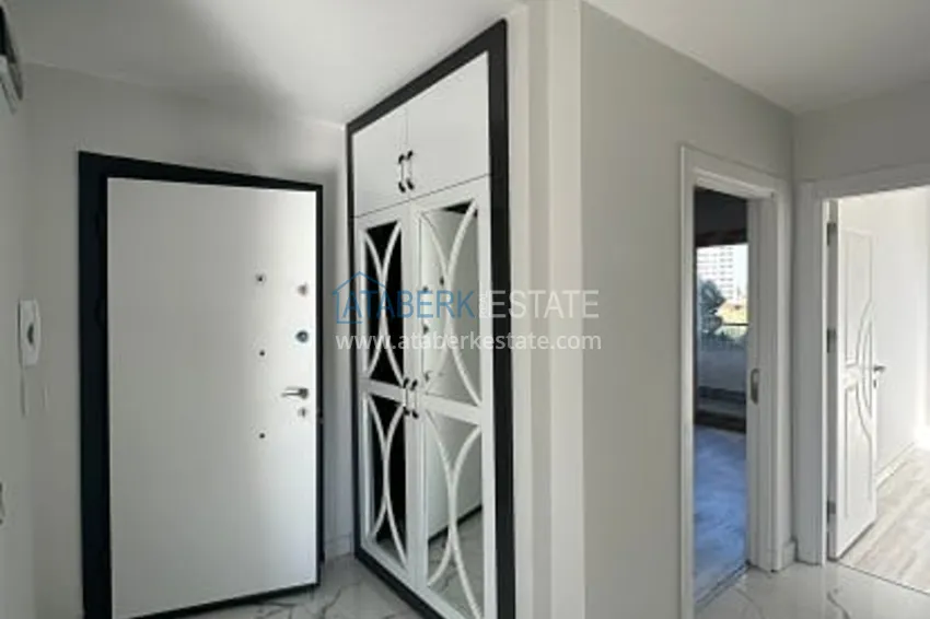 Приобрести Квартира 2+1 с чистовой отделкой, в новом ЖК с инфраструктурой, в районе Арпачбахшиш-Мерсин 14 