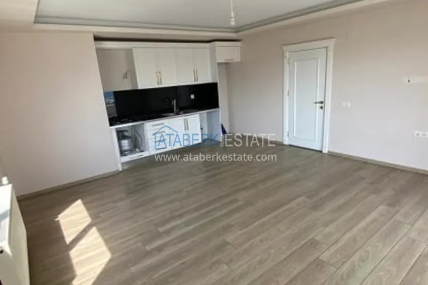 Приобрести Трехкомнатные апартаменты с видом на море и горе в уютном районе Томюк-Эрдемли 5 