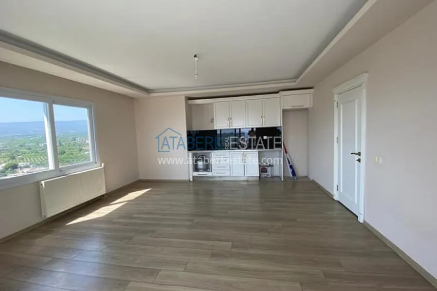 Приобрести Трехкомнатные апартаменты с видом на море и горе в уютном районе Томюк-Эрдемли 6 