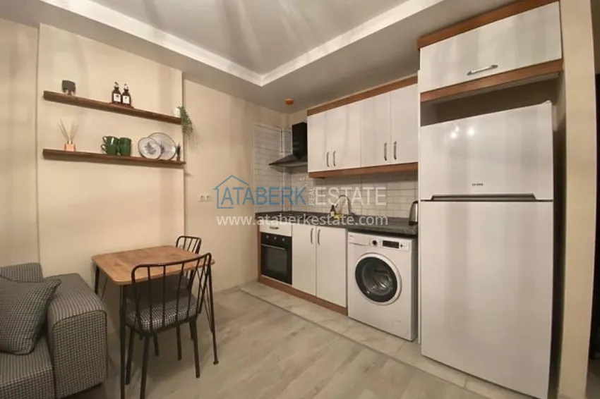 Приобрести Квартира 1+1 в развивающемся районе Мерсина-Арпачбахшиш 7 