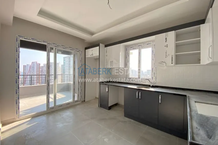 Приобрести Апартаменты 2+1 в новом жилом комплексе, в районе Тедже-Мерсин 12 