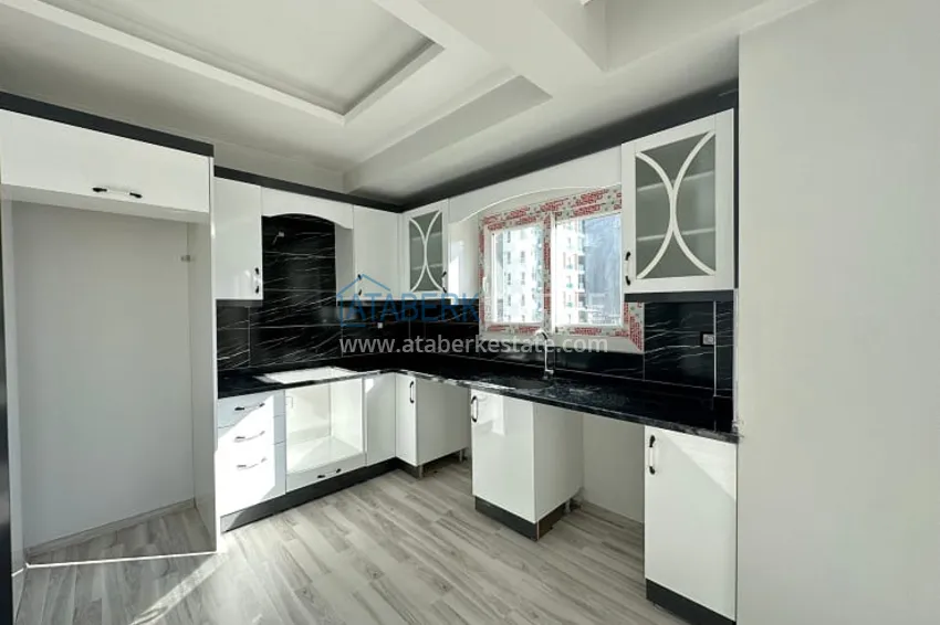 Приобрести Квартира 2+1 с чистовой отделкой, в новом ЖК с инфраструктурой, в районе Арпачбахшиш-Мерсин 12 