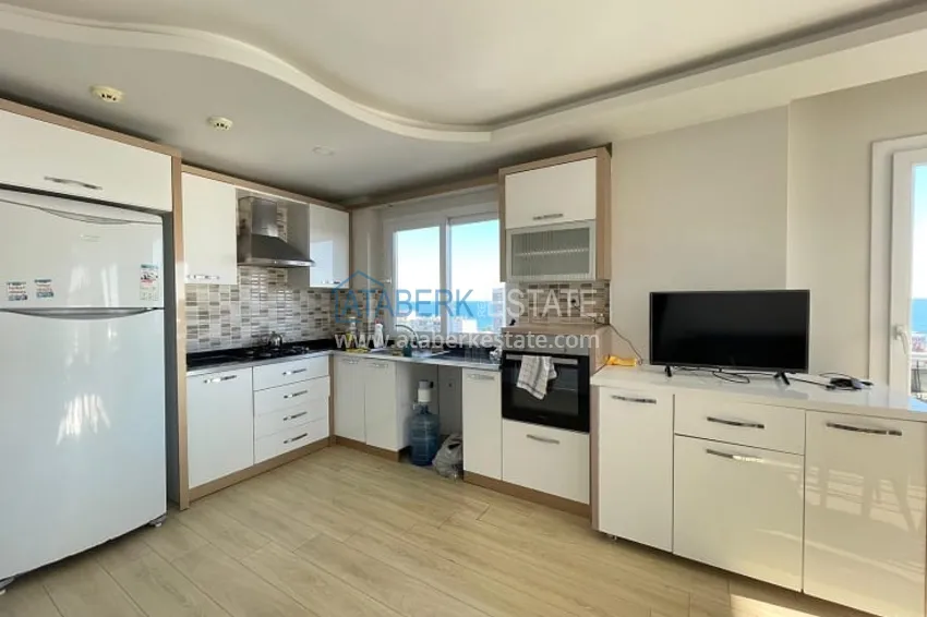 Приобрести Апартаменты 2+1 с видом на море, на второй береговой линии в районе Тедже-Мерсин 11 