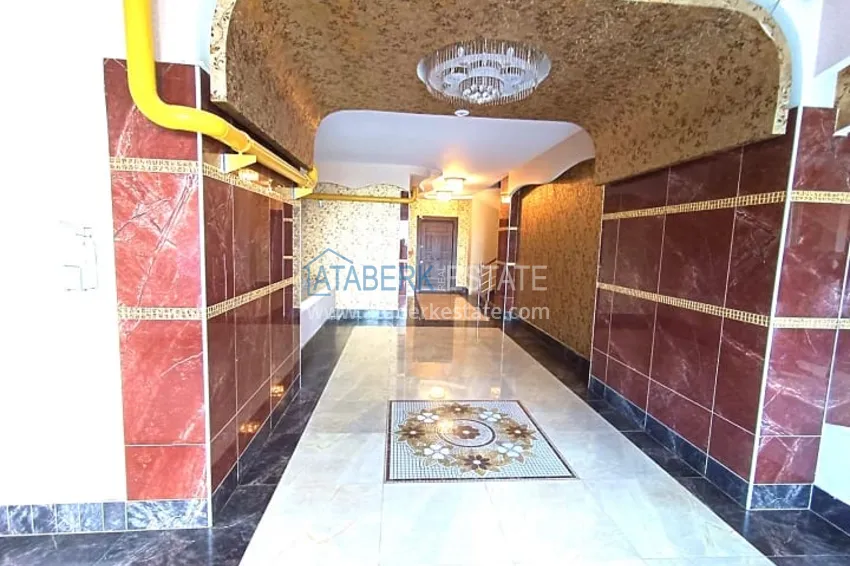 Квартира 4+1 с видом на море и горы в районе Енишехир-Мерсин 6 