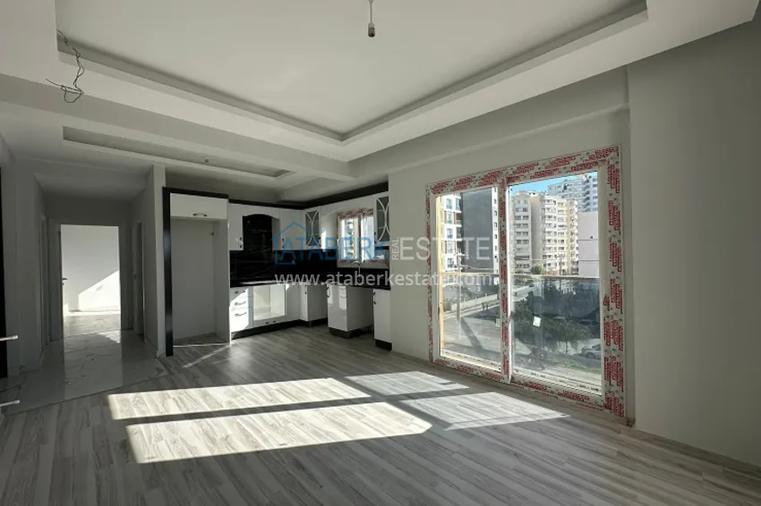 Приобрести Квартира 2+1 с чистовой отделкой, в новом ЖК с инфраструктурой, в районе Арпачбахшиш-Мерсин 2 