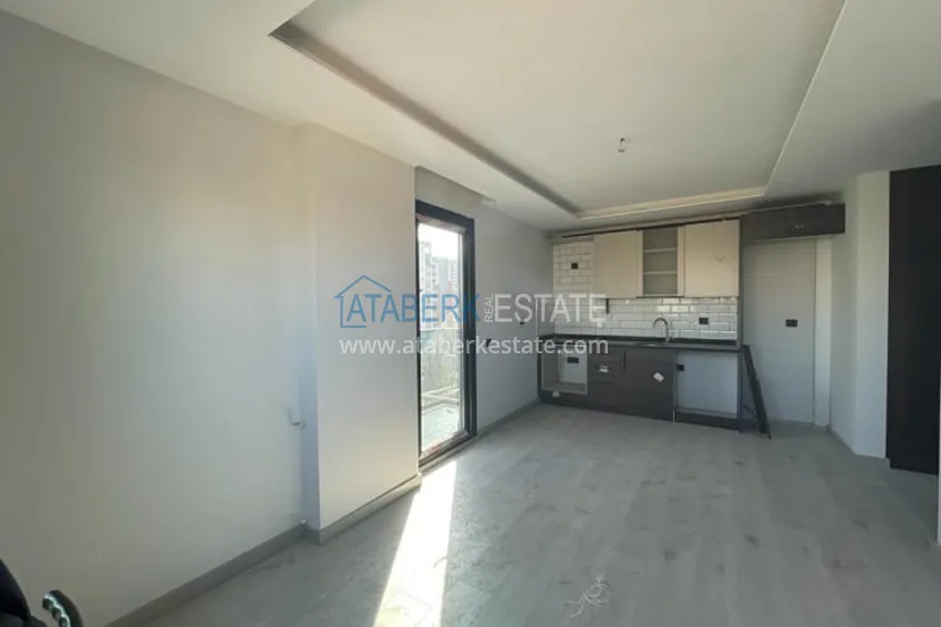 Приобрести Апартаменты 2+1 в небольшом городском комплексе в районе Енишехир-Мерсин 1 