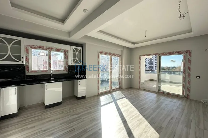 Приобрести Квартира 2+1 с чистовой отделкой, в новом ЖК с инфраструктурой, в районе Арпачбахшиш-Мерсин 3 