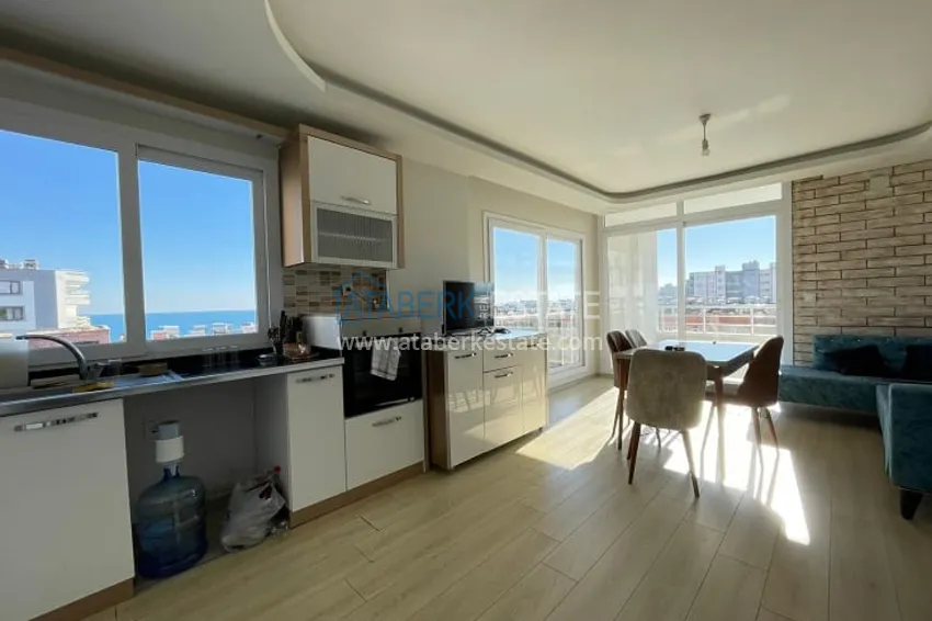 Приобрести Апартаменты 2+1 с видом на море, на второй береговой линии в районе Тедже-Мерсин 1 