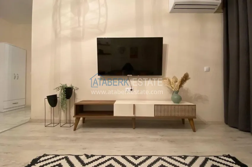 Приобрести Квартира 1+1 в развивающемся районе Мерсина-Арпачбахшиш 3 