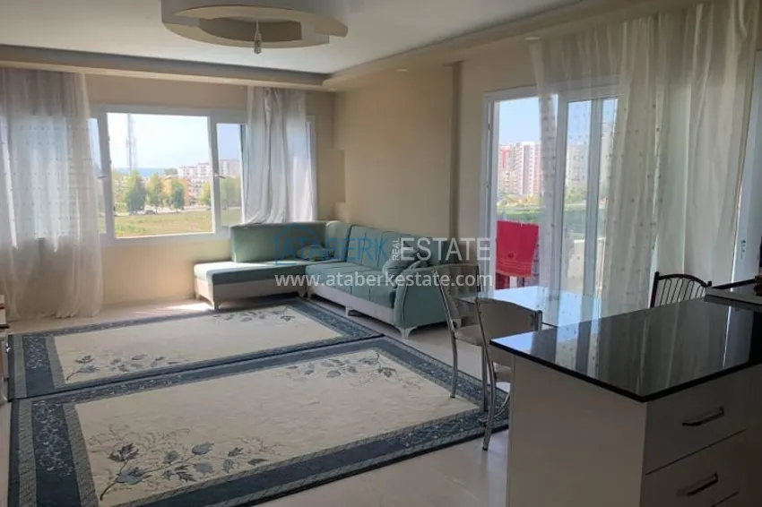 Приобрести Меблированная квартира 2+1 с открытым видом на горы, район Эрдемли в Мерсине 1 