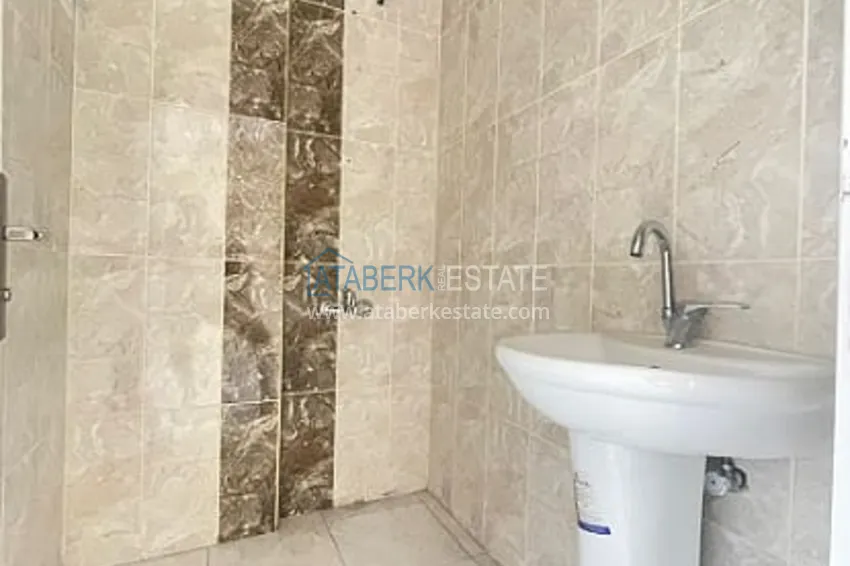 Приобрести Трёхкомнатная квартира в небольшом жилом комплексе в районе Тедже-Мерсин 14 