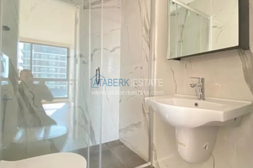 Приобрести Городская квартира 3+1 в молодом жилом комплексе, в центральном районе Мерсина-Енишехир 16 