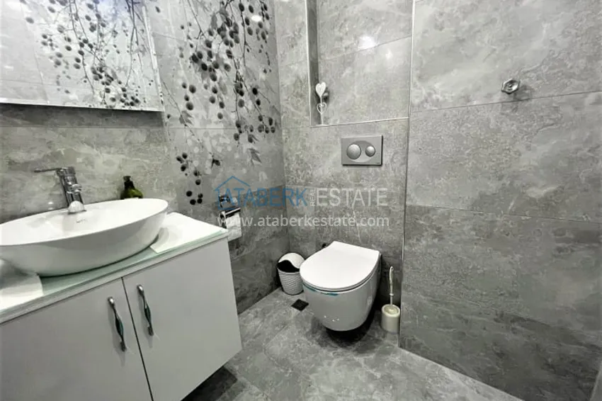 Приобрести Просторная четырехкомнатная квартира на первой береговой линии район Мезитли-Мерсин 11 