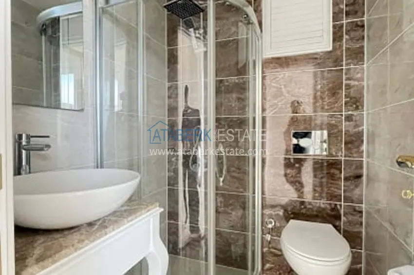 Приобрести Квартира 3+1 с видом на море и горы в районе Тедже-Мерсин 15 