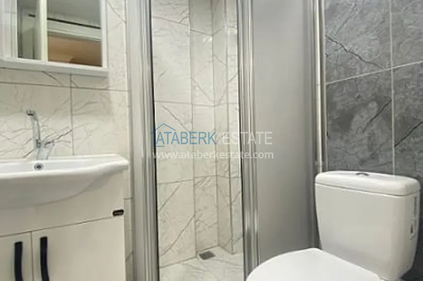 Приобрести Городская квартира в спальном районе Чифтликкей, города Мерсин 10 