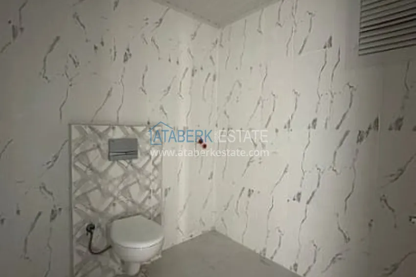 Приобрести Трехкомнатная квартира с застекленным балконом, в районе Эрдемли-Алата 16 