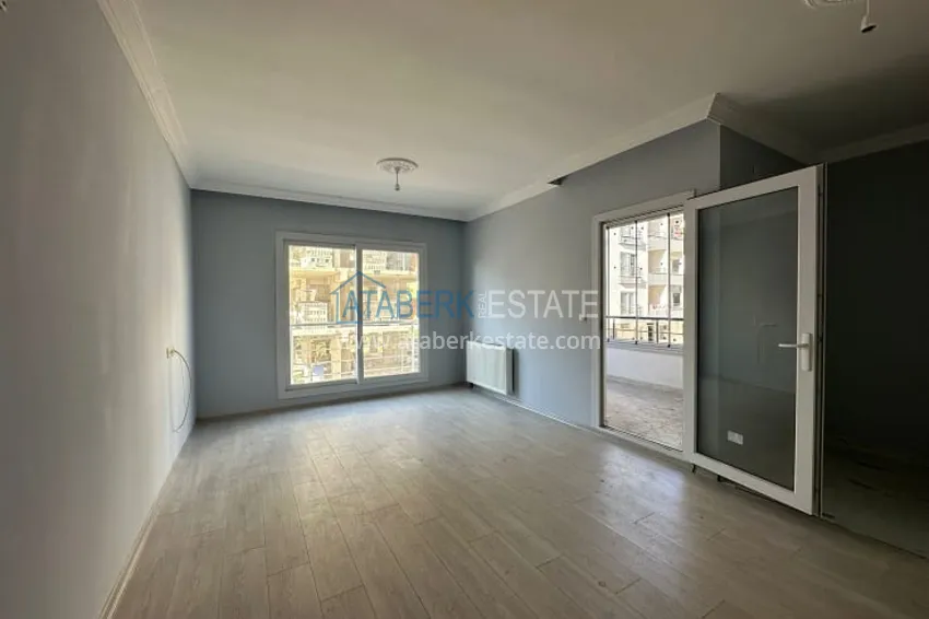 Приобрести Трехкомнатная квартира с застекленным балконом, в районе Эрдемли-Алата 1 