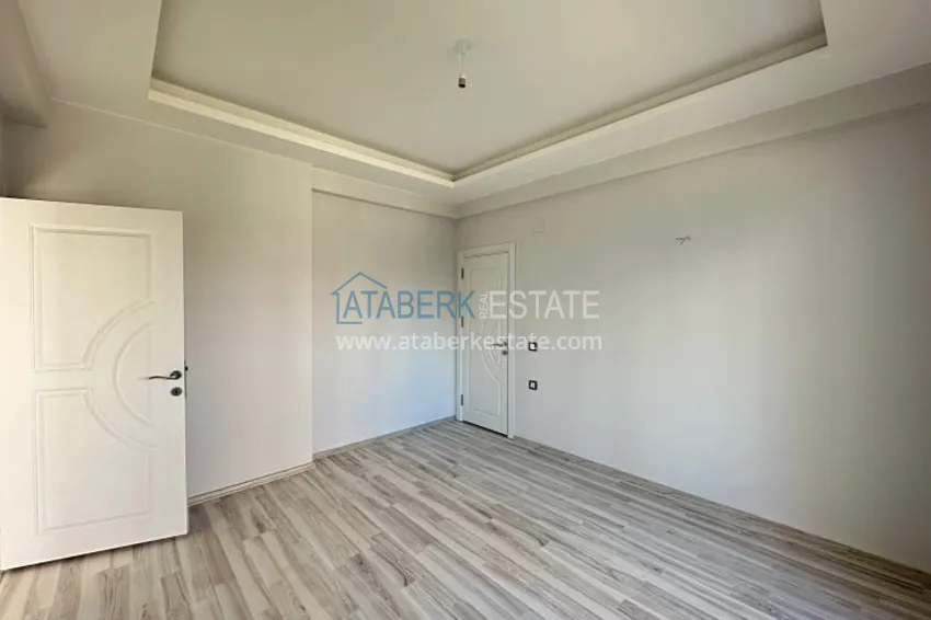 Приобрести Квартира 2+1 с чистовой отделкой, в новом ЖК с инфраструктурой, в районе Арпачбахшиш-Мерсин 4 