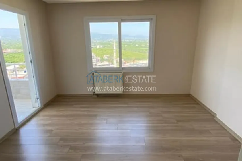 Приобрести Трехкомнатные апартаменты с видом на море и горе в уютном районе Томюк-Эрдемли 2 