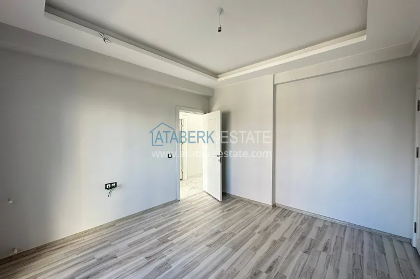 Приобрести Квартира 2+1 с чистовой отделкой, в новом ЖК с инфраструктурой, в районе Арпачбахшиш-Мерсин 6 