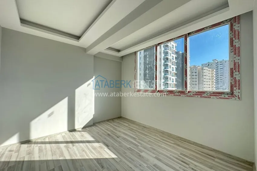 Приобрести Квартира 2+1 с чистовой отделкой, в новом ЖК с инфраструктурой, в районе Арпачбахшиш-Мерсин 7 