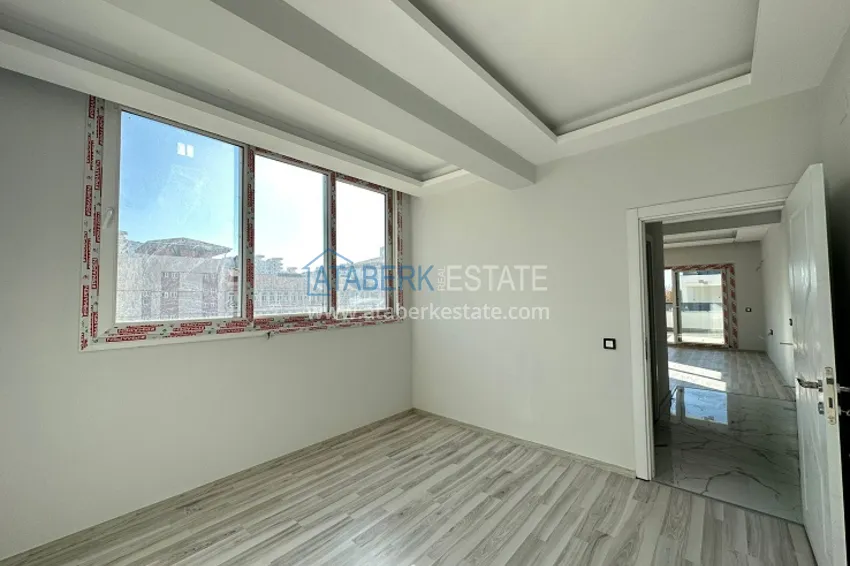 Приобрести Квартира 2+1 с чистовой отделкой, в новом ЖК с инфраструктурой, в районе Арпачбахшиш-Мерсин 9 