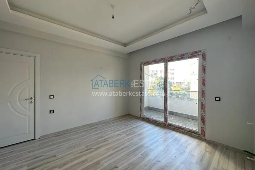 Приобрести Квартира 2+1 с чистовой отделкой, в новом ЖК с инфраструктурой, в районе Арпачбахшиш-Мерсин 11 