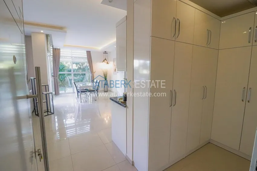 Приобрести Садовый дуплекс 2+1 в Кестеле с мебелью в благоустроенном комплексе, подходит для гражданства 1 