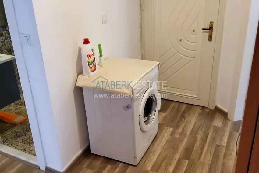 Приобрести Трехкомнатная квартира с мебелью после ремонта в центре Махмутлара – район вторничного рынка 1 