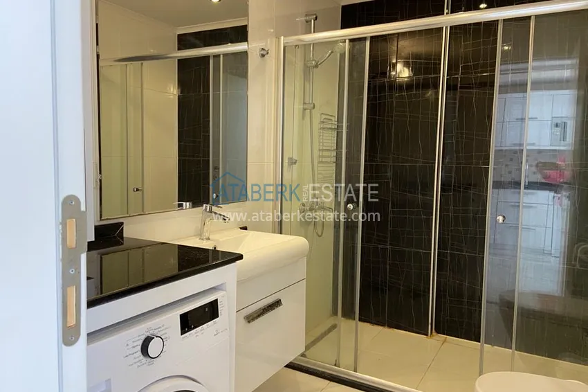 Приобрести На аренде квартира 1+1 с выходом в сад в курортном районе Алании - Авсаллар C1 10 