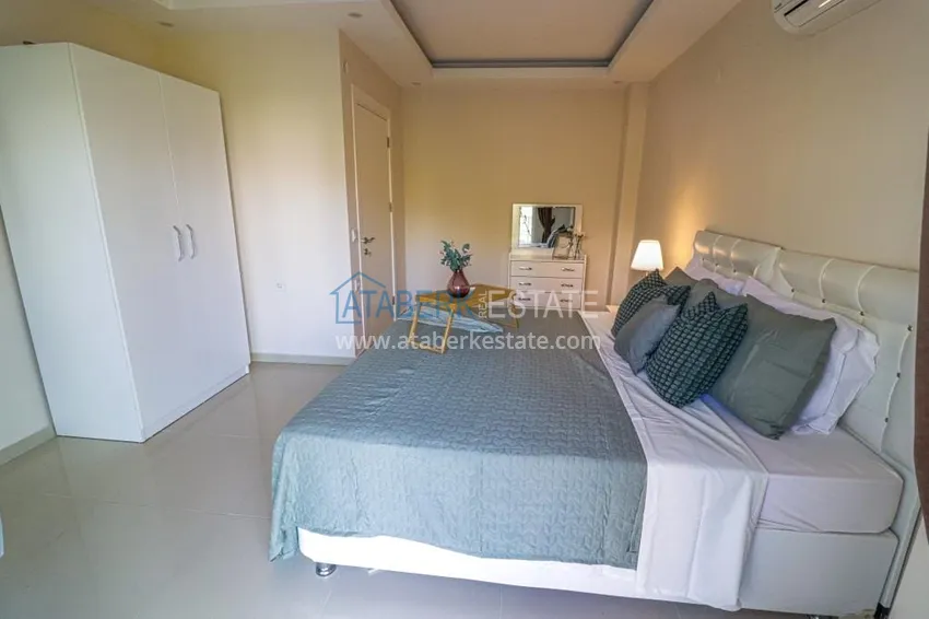 Приобрести Садовый дуплекс 2+1 в Кестеле с мебелью в благоустроенном комплексе, подходит для гражданства 12 