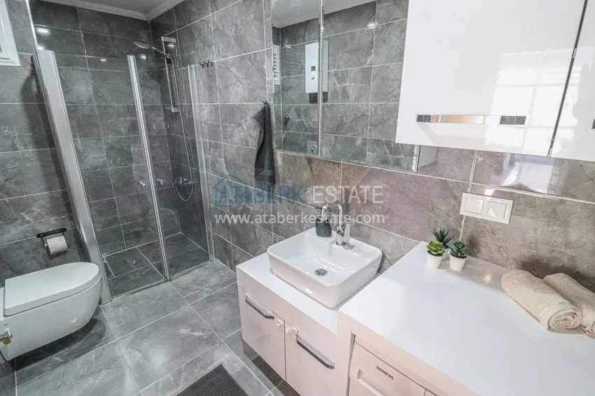 Приобрести Садовый дуплекс 2+1 в Кестеле с мебелью в благоустроенном комплексе, подходит для гражданства 13 