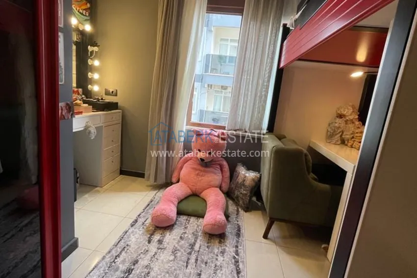 Приобрести Трёхкомнатная квартира с застекленным балконом, рядом с морем, район Оба - Алания  13 