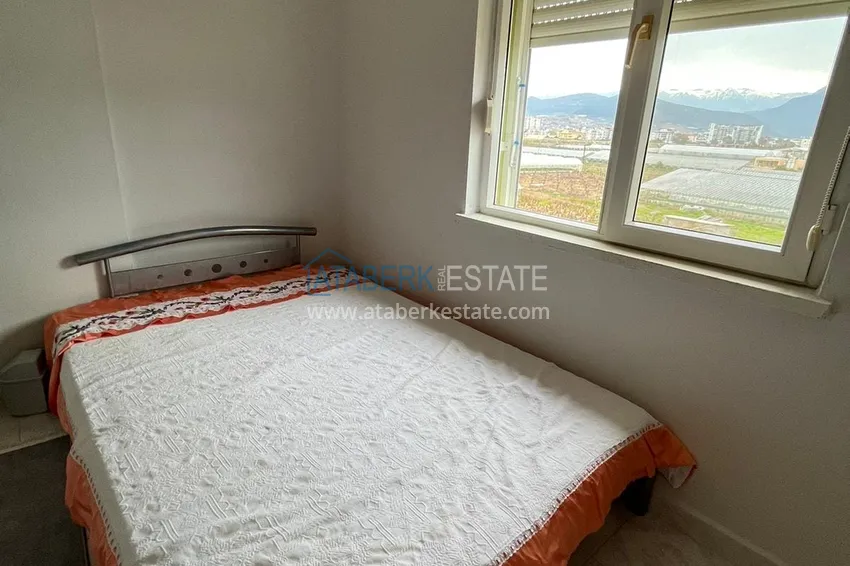 Приобрести Просторная четырехкомнатная квартира с 3 спальнями и открытым видом на горы в Газипаше 15 