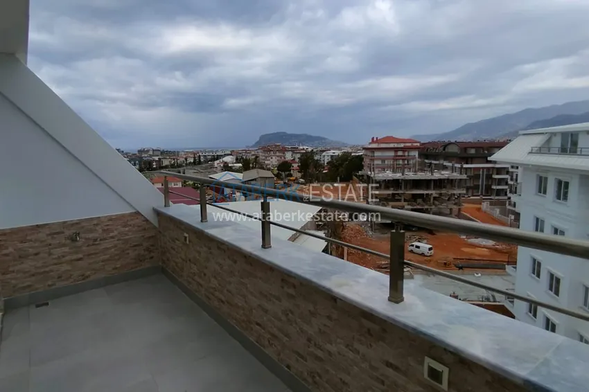 Приобрести Пентхаус-дуплекс с двумя спальнями и застекленным балконом в районе Оба, Алания 14 