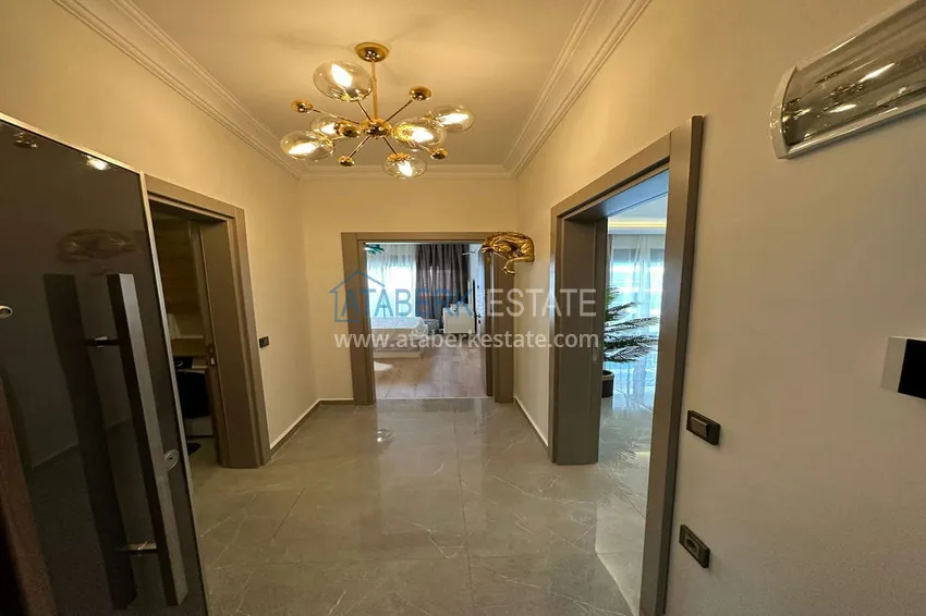 Приобрести Квартира 1+1 с новой мебелью, видом на море и горы, Махмутлар – Алания 2 