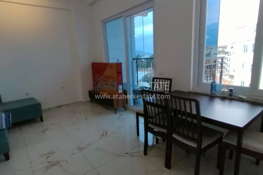 Приобрести Пентхаус-дуплекс с двумя спальнями и застекленным балконом в районе Оба, Алания 1 