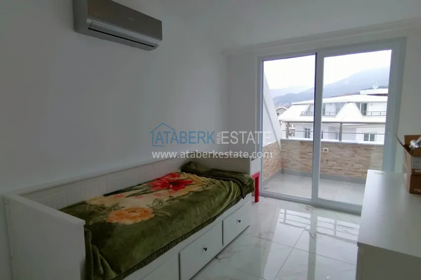 Приобрести Пентхаус-дуплекс с двумя спальнями и застекленным балконом в районе Оба, Алания 2 