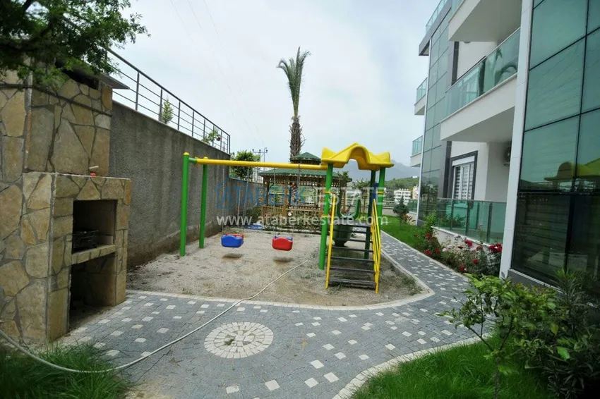 Садовый дуплекс 2+1 в Кестеле с мебелью в благоустроенном комплексе, подходит для гражданства 6 