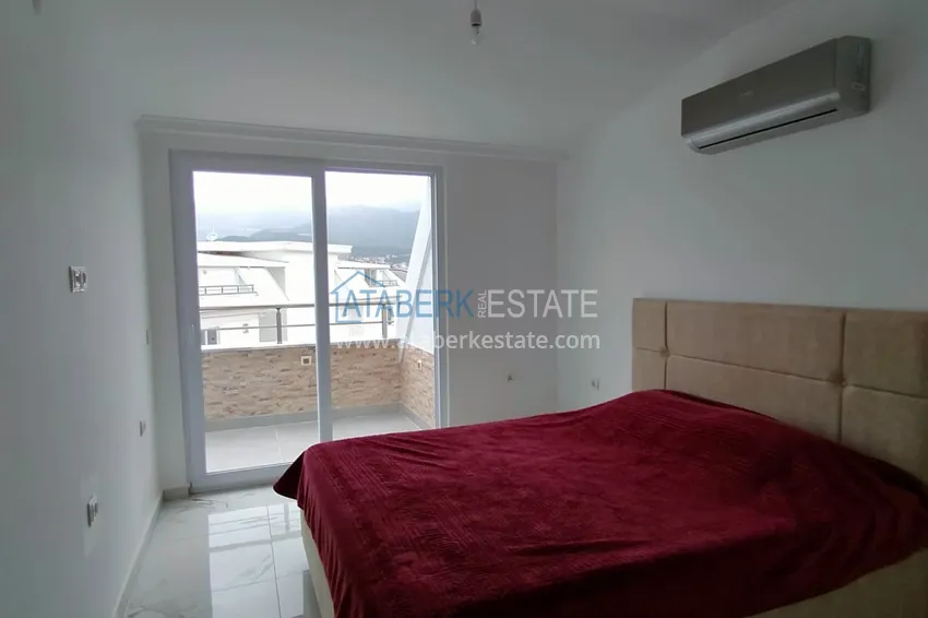 Приобрести Пентхаус-дуплекс с двумя спальнями и застекленным балконом в районе Оба, Алания 4 