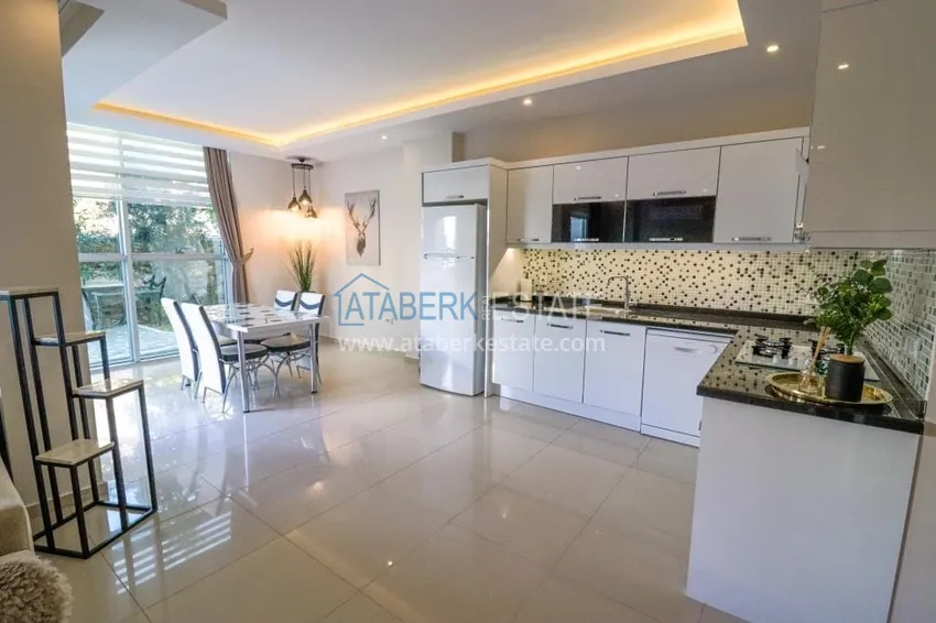 Приобрести Садовый дуплекс 2+1 в Кестеле с мебелью в благоустроенном комплексе, подходит для гражданства 5 