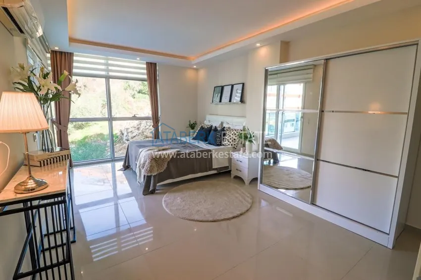 Приобрести Садовый дуплекс 2+1 в Кестеле с мебелью в благоустроенном комплексе, подходит для гражданства 7 