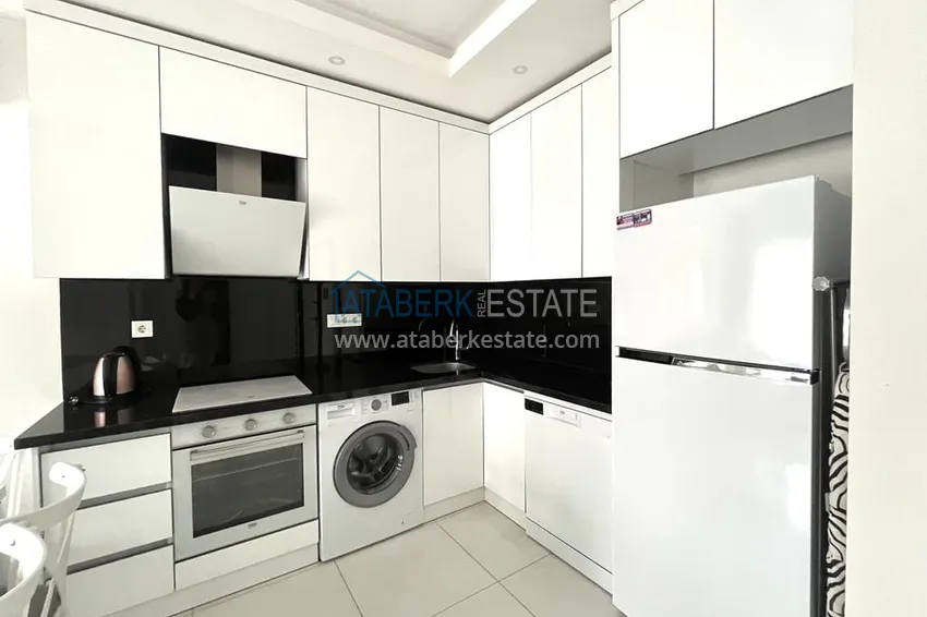 Приобрести Аренда двухкомнатной квартиры в комплексе отельного типа – Алания, район Махмутлар A6 6 