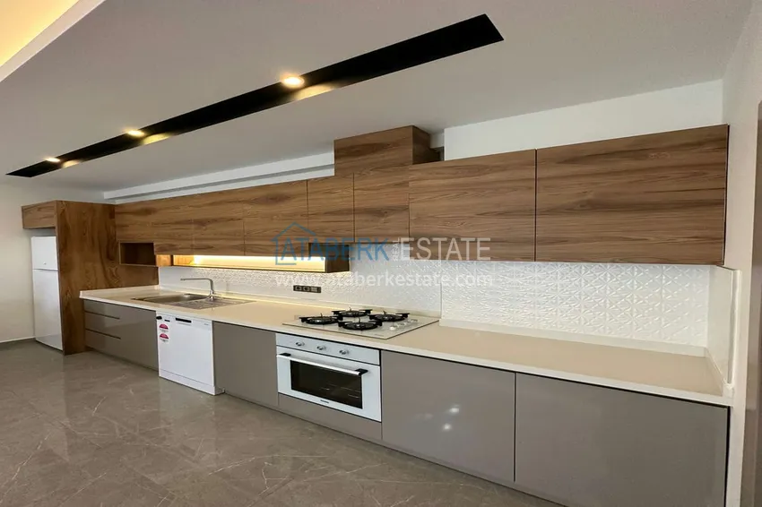 Приобрести Квартира 1+1 с новой мебелью, видом на море и горы, Махмутлар – Алания 10 