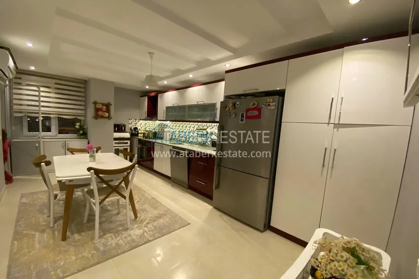 Приобрести Четырехкомнатная квартира с мебелью в Алании - район Тосмур 7 